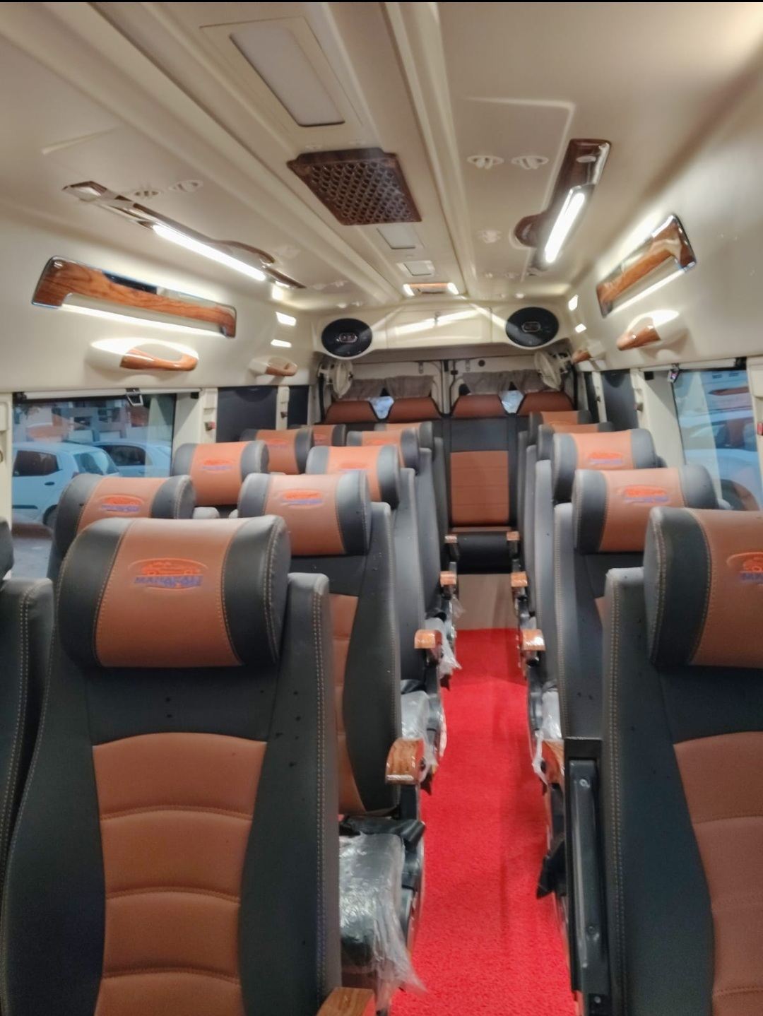 Maharaja Tempo Traveller pushback seat interior